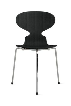 an image of a black chair with chrome legs