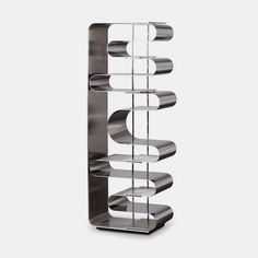 a metal shelf with three shelves on each side and four different sections in the middle