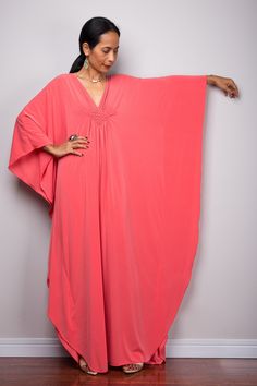 "Kaftan, Pink Loose fit evening dress, party dress, Coral Pink Kimono dress, Candy Pink women's Maxi Dress, Oversized frock dress, maternity dress PRODUCT SIZE : Free Size * Chest : free up to 32 - 58\" * Waist : free up to 58\" * Hips : free up to 56\"  * Length : 56\" from shoulder to hem (measured when laying flat) MATERIAL  * ITY Polyester * No lining MODEL :  * Model chest : 32\", waist : 24\" hips : 35\"  * Combined Height is 5\"6 > I'm 5\"2 (158cm) and I'm wearing 4\" heels in the picture Pink V-neck Kaftan For Evening, Elegant Pink V-neck Kaftan, Long Pink Party Dress, Solid Tunic Dress For Spring, Solid Color Tunic Dress For Spring, Free Size Pink Long Sleeve Maxi Dress, Pink Long Sleeve Maxi Dress In Free Size, Pink Long Sleeve Free Size Maxi Dress, Long Pink Kaftan For Party