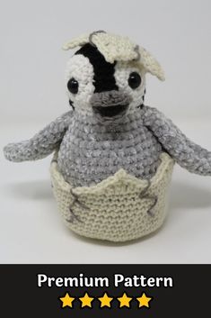 a crocheted stuffed animal sitting on top of a table