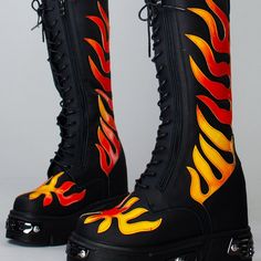 Ignite Your Bold Look With This Hot Anthony Wang X Wtf Gg3 Flaming Fury Black Platform Boots. These Ferocious Rave Festival Boots Feature A Black Colored Vegan Leather Outer, Lace-Up Front With Dual Zipper Closure, Ombre Flame Detailing, Metal Plate Accent, And Chunky Soles. Throw These Rad Af Platform Boots On And Set The Roof On Fire! -Wtf Gg3 Flaming Fury Black Platform Boots -4.5" Heel, 2" Platform -Vegan Leather -Lace Up Detail -Full Side Zip Closure -Flame Applique Detail -Black/Red Fire Inspired Outfits, Flame Applique, Flame Outfit, Flame Shoes, Flame Boots, Heath Burns, Shoe References, Platform Boots Outfit, Fire Boots