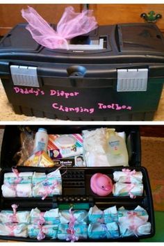 an open suitcase filled with baby diapers and other items next to a pink bow