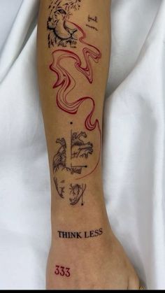 a person with a tattoo on their leg that reads think less 533 and has a tiger in it