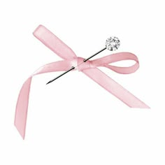 a pink ribbon with a diamond pin on it