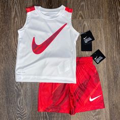 Tank Top Is Crew Neck, Dri-Fit, 100% Polyester, Nike Graphic On Chest. Shorts Are Pull-On, Elastic Waistband, 100% Polyester, Nike Logo Left Lower Leg. Red Sports Sets For Spring, White Sleeveless Sports Set, White Sports Sets For Summer, Sporty Red Sets For Spring, White Nike Playwear Sets, Nike White Summer Sets, White Nike Summer Sets, Nike White Sets For Spring, Nike Sporty White Sets