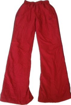 Nike Cotton Jogging Pants, Nike Cotton Sporty Pants, Nike Sporty Cotton Pants, Sporty Red Cotton Sweatpants, Red Cotton Joggers For Jogging, Red Cotton Sweatpants For Jogging, Nike Cotton Activewear Long Pants, Red Athleisure Sweatpants For Sports, Red Cotton Activewear For Loungewear