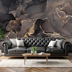 a living room with black leather couches and marble wallpaper