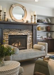 the pinterest app is showing an image of a living room with fireplace and couches