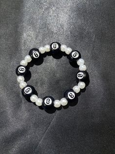 Handmade eight ball faux pearl beaded elastic bracelet. Available in circumference sizes of 5.0" (S), 6.2" (M), and 7.8" (L). 8 Ball Bracelet, Goth Bead Bracelet, Dice Bead Bracelet, Gothic Adjustable Black Beaded Bracelets, Gothic Black Beaded Bracelets, Ball Bracelet, Elastic Bracelet, Pearl Beads, Cute Jewelry