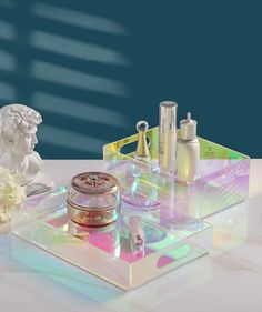 an assortment of beauty products displayed on a table