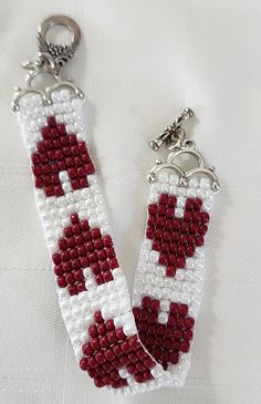 two red and white beaded key chains