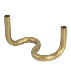 a gold colored metal hook on a white background