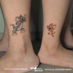 two people with matching tattoos on their legs, one has a cat and the other has a mouse