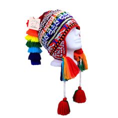 "FREE SHIPPING  FREE SHIPPING  This colorful Chullo is a handmade hat made by indigenous from the Andes in Pisac Cusco - PERU, woven in multicolored wool yarn, with ear flaps and decorated with beads all around, which are sewn one by one. This particular one has a design of the \"Andean Llama\",South American camelid from the Andean cultures. If laid flat, the Chullo alone is approximately 12\" long x 10.5\" wide. Including the pompoms on the bottom and all of the top, it measures from end to end 24\" approximately The CHULLO (in Aymara -Quechua: Ch'u llu) is a hat with earmuffs woven in alpaca wool or sheep wool and in combination with synthetic fibers. It is native to the South American Andean highlands, where it is used to protect against the cold weather. In Peru it is characterized by Wool Gifts, Cusco Peru, Handmade Hat, Skull Cap Beanie, Beautiful Hats, Alpaca Wool, Earmuffs, Sheep Wool, How To Make Ornaments