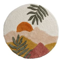 a round rug with plants and mountains in the background, on a white floor mat