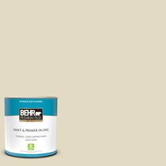 the behr paint is light tan and has a brown base with white trim on it