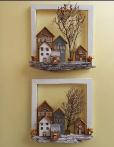 two frames with houses and trees on them