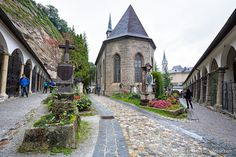 an old cobblestone street lined with stone buildings