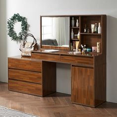 a wooden desk with a mirror on top of it