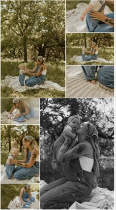 a woman holding a baby while sitting on top of a blanket in front of trees