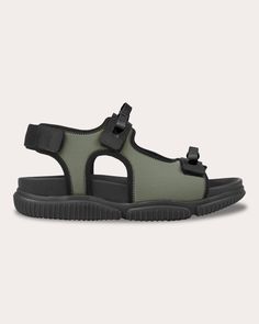 A utilitarian take on Cecilie Bahnsen's hyper-feminine aesthetic, the Valeria sandal pairs its comfortable neoprene upper with patent bow embellishments. The treaded outsole and hook-and-loop straps ensure practicality is top of mind.Hook and loop closurePatent bow embellishmentsTreaded outsoleNeopreneUpper: 53% polyester, 40% neoprene, 7% polyamideLining: 100% TPUSole: 100% TPUSpot cleanMade in Portugal Size & Fit Fits true to size Sustainability Metrics: Circular Economy: product is intentionally designed with 50% of actively cycled materials Organic Materials: at least 60% of materials used for production come from natural sources and do not contain harmful toxins or waste Craft & Community: at least 75% of products are fully sourced and manufactured within the specified community or co Shoes Moodboard, Bow Embellishments, Hyper Feminine, Cecilie Bahnsen, Animal Fur, Circular Economy, Organic Materials, Feminine Aesthetic, Animal Welfare