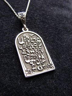 Armenian Alphabet Silver Necklace, Armenian Letters. Armenian Handmade Jewelry, Silver Chain as a Gift, Armenian Letters, Gift for Her / Him.The original pendant with beautiful engraving of the Armenian alphabet made of high-quality sterling silver (925 stamp is on the ring). Master used the method of blackening to highlight the ornament on the pendant.weight of the pendant - 6.2 gramHeight of pendant - 3.8 cm / 1.5 incheswidth - 1.8 cm / 0.7 inchesAs a gift you will get also sterling silver cha Letters Gift, Armenian Alphabet, Ring Master, Pomegranate Earrings, Alphabet Pendant, Lucky Bracelet, Purple Stones, Evil Eye Bracelet, Jewelry Silver