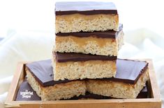 All you need is a handful of ingredients and 20 minutes of your time to make these chewy peanut butter bars topped with a layer of caramel and chocolate ganache. A delicious homemade version of the Whatchamacallit® candy bar! Whatchamacallit Bars, Whipped Shortbread Cookies, Coconut Dessert, Krispy Treats, Butter Bars, Brownie Desserts, Rice Krispy, Peanut Butter Bars