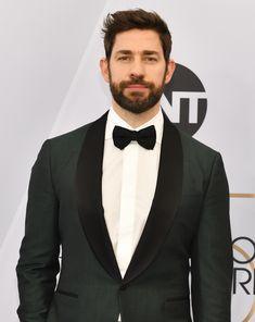 a bearded man in a tuxedo and bow tie