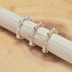 This plain beaded stacking ring is a timeless and versatile accessory, designed with  2mm and 4mm beads for a sleek, textured finish. Crafted from high-quality beads, it offers a minimalist look that's perfect for stacking with other rings or wearing solo for a subtle, refined style. Comfortable and durable for everyday wear, this ring blends simplicity with elegance, making it an essential addition to any jewellery collection.  PRODUCT SPECIFICATION Choose the bead colour you would like. Bead S Beaded Stacking Rings, Stretchy Rings, Elastic Rings, Stretch Ring, Style Comfortable, Thumb Ring, Refined Style, Thumb Rings, Beaded Rings