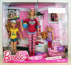 a barbie doll and her family in their pink bedroom