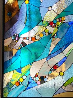 a close up of a stained glass window