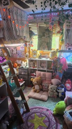 a room filled with lots of stuffed animals next to a ladder in the middle of it