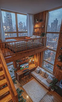 a living room filled with furniture and tall windows