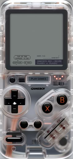 an old gameboy with buttons and controls in it's plastic case, on display