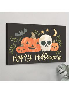 a halloween sign with pumpkins and skulls on it