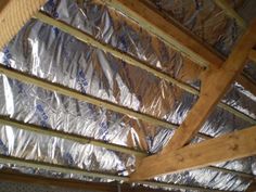 aluminum foil covering the roof of a house