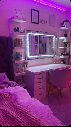 a bedroom with a desk, mirror and lights