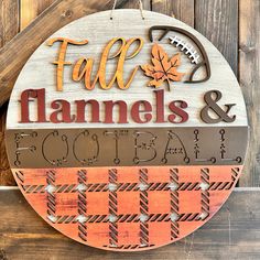 a wooden sign that says fall, flannels and football