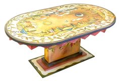 an artisticly designed table with colorful designs on the top and base, against a white background