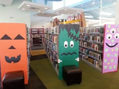 some bookshelves are decorated to look like halloween characters