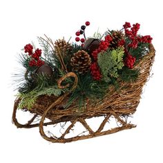 a wooden sleigh filled with pine cones and berries