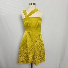 Description: Sleeveless Asymmetrical Thick Double Strap Side Zipper Closure With Hook And Loop Structured Bodice Floral Flower Patchwork Embellishment Fully Lined Mustard Yellow Color Fabric Content: Body 96% Polyester, 4% Elastane/ Lining 95% Polyester, 5% Elastane Size: 6 Approx. Measurements- Length: 37" Pit To Pit: 15.5" Waist: 14" Armhole/Sleeve Length: Hem: Condition: Pre-Owned. Good. Item#: 100212 __________________________________________________________________ *Pre-Owned Items May Include Minimal Signs Of Gentle Wear Unless Otherwise Specified. Our Measurements Provided Are Approximate (Laid Flat, In Inches). Use Measurements Provided To Gauge Fit Comparable To Flower Patchwork, Karen Millen Dress, Mustard Yellow Color, Yellow Satin, Color Fabric, Size 6 Dress, Karen Millen, Floral Flower, Measurement Length