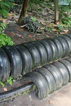 a bunch of tires that are laying on the ground