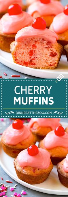 cherry muffins with pink frosting and cherries on top, sitting on a white plate