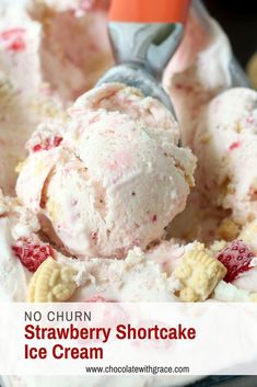 no churn strawberry shortcake ice cream in a bowl with a scoop full of ice cream