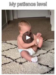 a baby is sitting on the floor playing with a ball and some words that say, my patience level