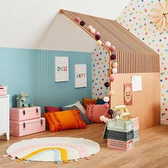 a child's bedroom decorated in pastel colors