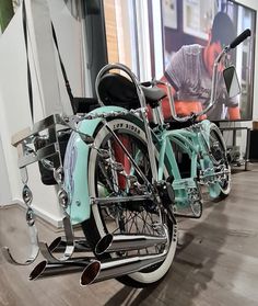 two bikes parked next to each other on display