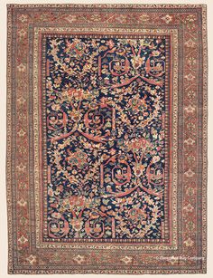 an antique persian rug with blue and red colors