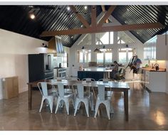 a large open kitchen and dining room area